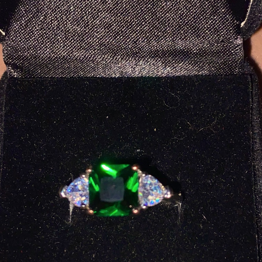 Square cut ring with trillion cz on the side size 8